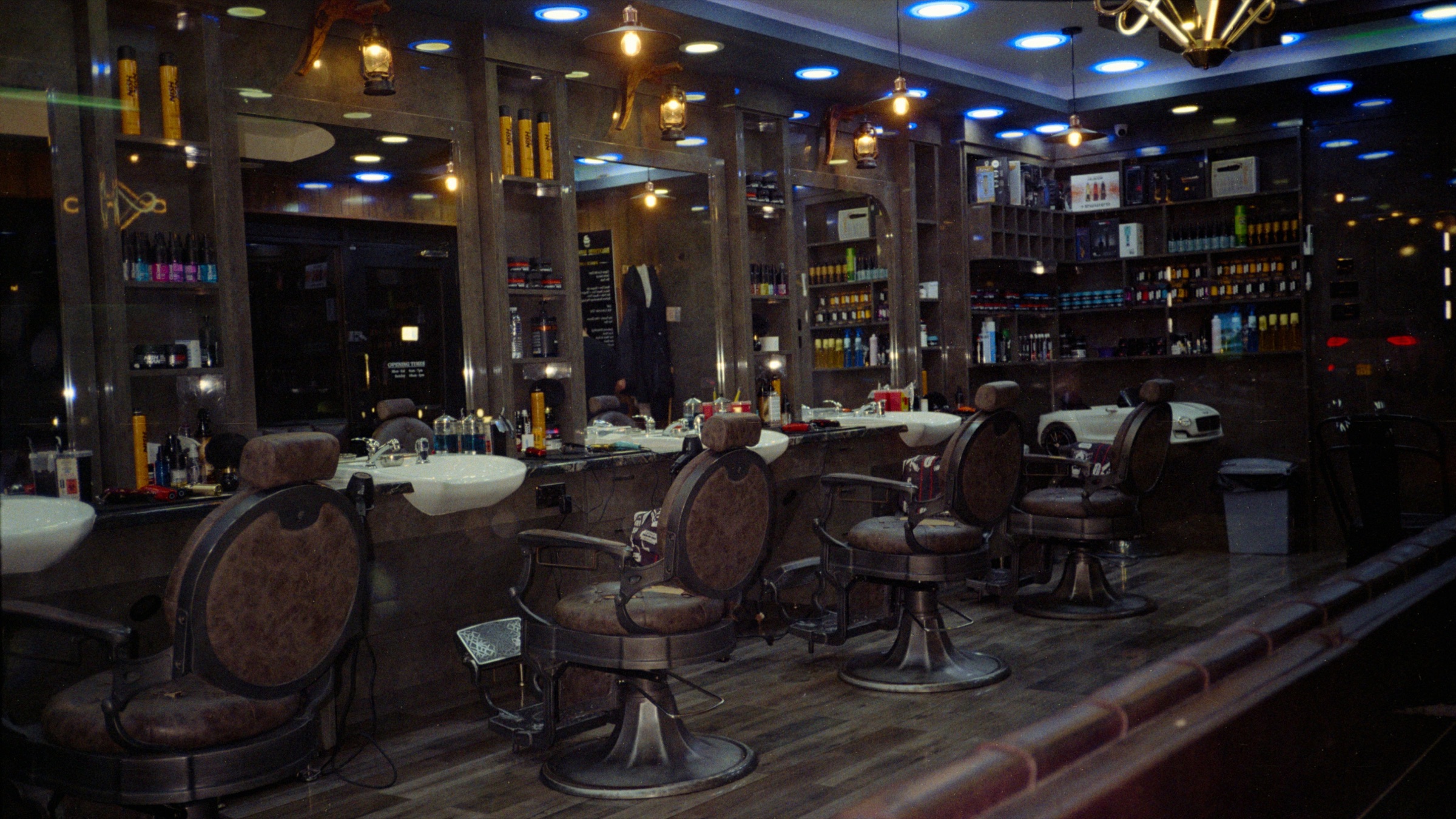 Atmospheric independent barbershop with vintage chairs