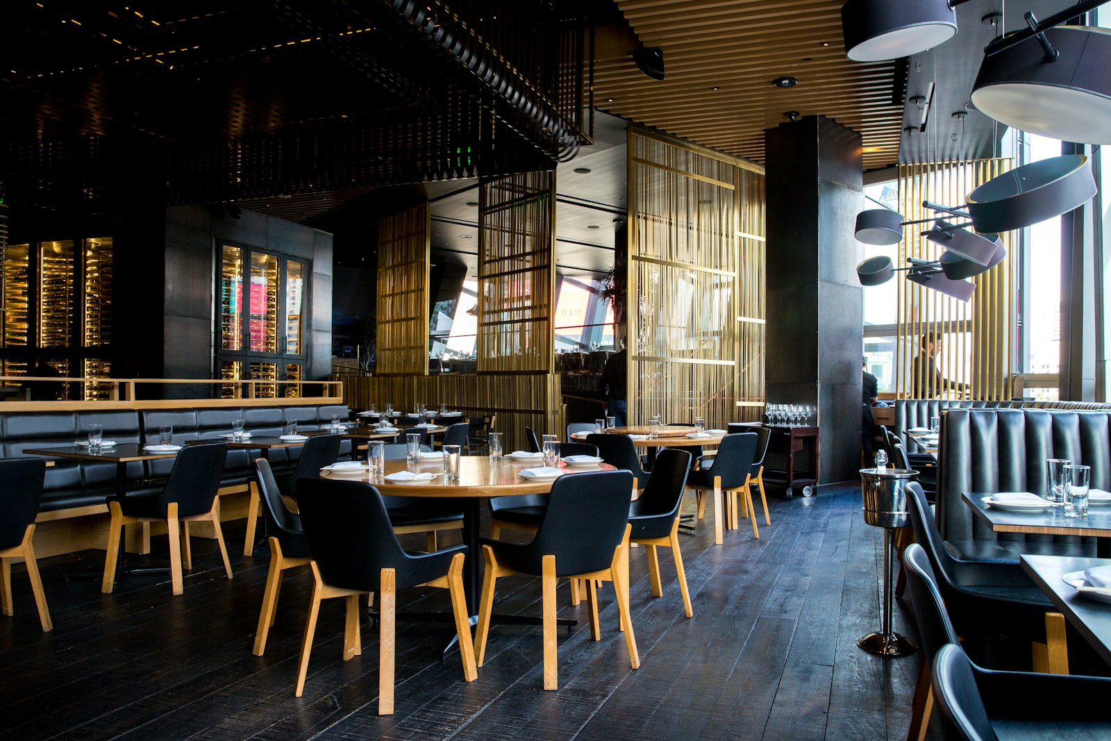 Warm restaurant interior prepared for service